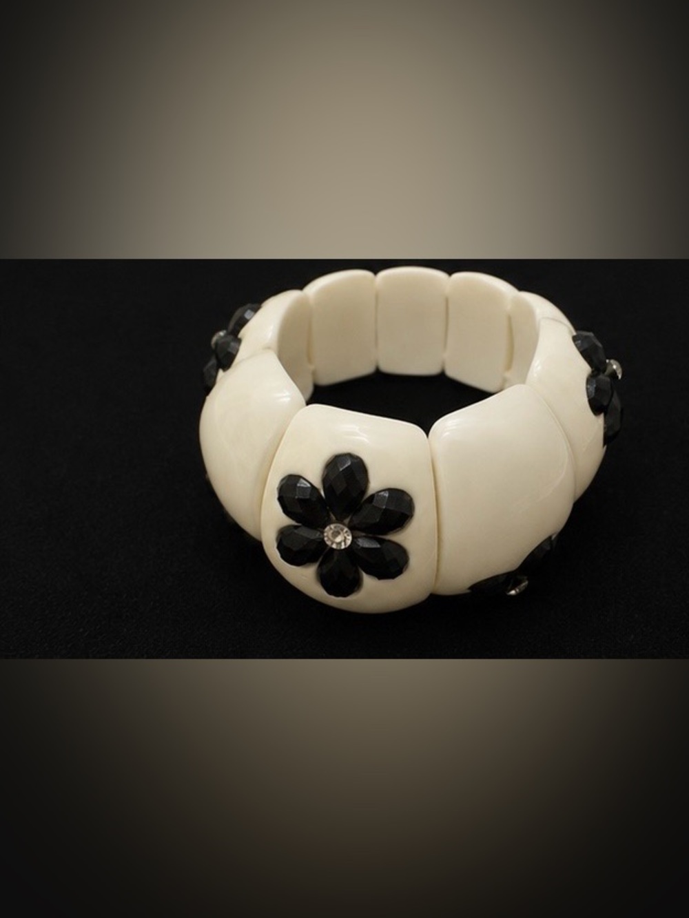 Ivory Stretch Bracelet with Black Crystal Flower